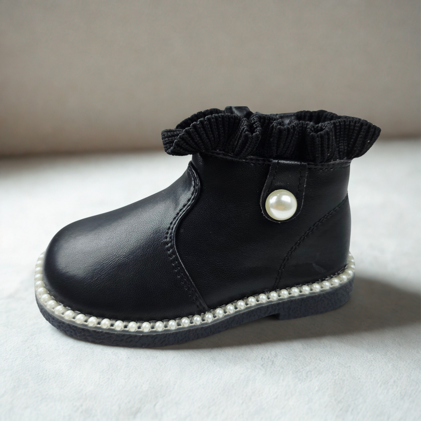 Black children's ankle boots with pearl details