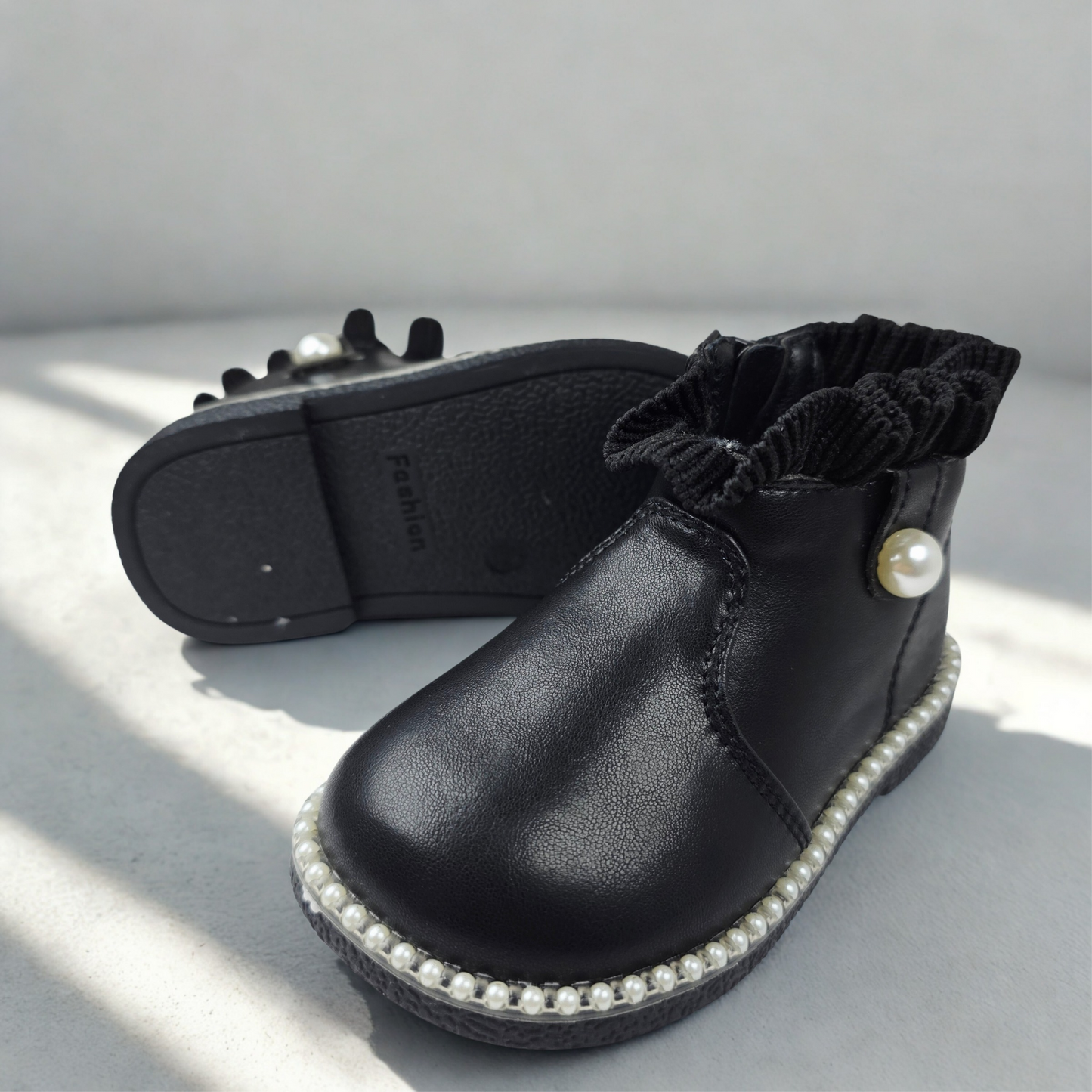 Black children's ankle boots with pearl details