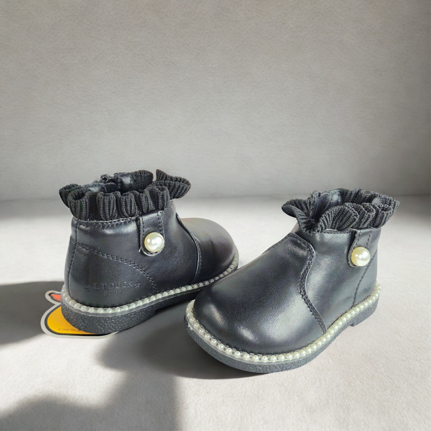 Black children's ankle boots with pearl details