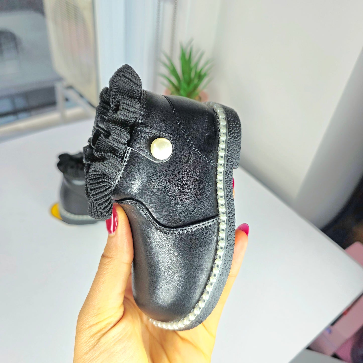 Black children's ankle boots with pearl details